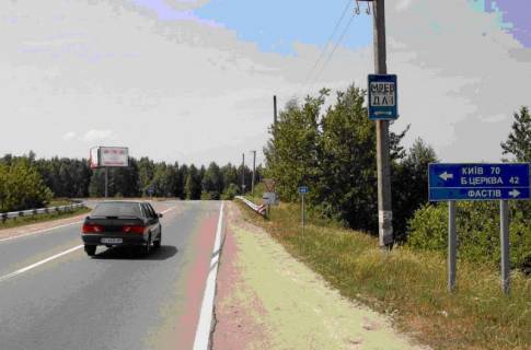 Билборд A в Фастове перекресток ул. Щербакова, Окружной и дороги на Бышев (клумба) въезд с Бышева фото 1
