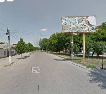 Билборд A в Балта ул.Уварова 65, ул. Толстого, школа, направление в центр города. фото 1