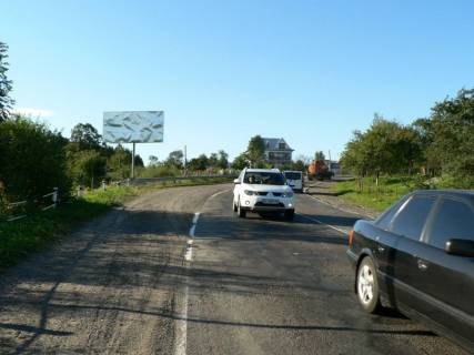 Білборд, Бігборд (Борд)   у Делятині Траса Н-09 Мукачево-Львів, с.Делятин, в`їзд зі сторони Івано-Франківська, 10 км до Яремча, поворот на Чернівці, напрямок руху на Буковель Фото 1