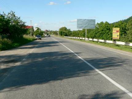 Билборд A в Яремче, 3x6  Траса Н-09 Мукачево-Львів, виїзд з міста в сторону Івано-Фр, біля кам`яного знаку Яремче,  напрямок руху на Івано-Франківськ фото 1