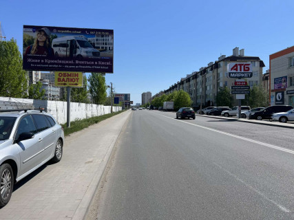 Билборд B в Крюковщине, Board 3x6м  вул. Одеська, 17, поруч ЖК  "Богуславська, 3", навпроти "АТБ- Маркет", "EVA", "NOVUS", "Аптека Доброго Дня", в бік с. Гатне фото 1