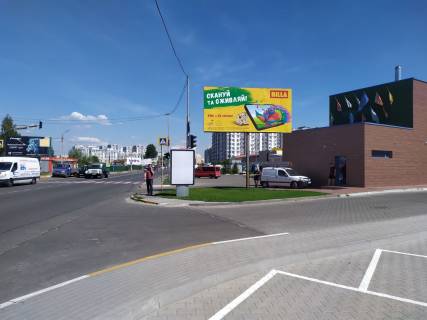 Билборд A в Крюковщине, Board 3x6м  Вул. Балукова, 7, біля ТРЦ "Наше Небо", "NOVUS", "JYSK", Ресторан "Дід Madrid", "Domino’s Pizza", "Ігроленд", ЖК "iHome", в бік м Києва фото 1