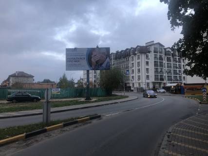 Білборд B у Петропавлівська Борщагівка, Board 3x6м  Клумба вул. Я. Мудрого / вул. Мальовнича/вул. Одеська , біля ЖК «Празький», "ФОРА", Магазин одягу "Fashion Racing", Міні-сад "КАРОЛИНКА", в напрямку Петропавлівської Борщагівки Фото 1