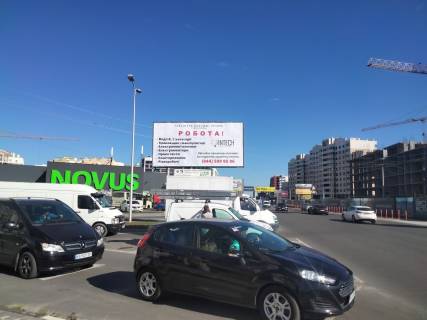 Билборд A в Вишневое, Board 3x6м  вул. В. Стуса, поруч "Розетка", "ЄВА", перед поворотом до парковки "Novus", перший заїзд на парковку, направ. на Крюківщину фото 1