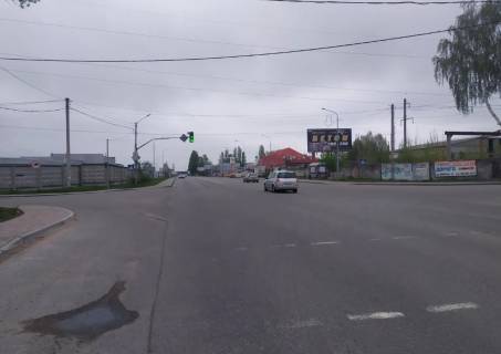 Білборд, Бігборд (Борд)  A у Святопетрівському, Board 3x6м  вул. Київська/вул. Індустріальна, світлофор, перехрестя, зупинка "Асфальтний завод", "Car service", Ресторан "Дальній кордон" Фото 1