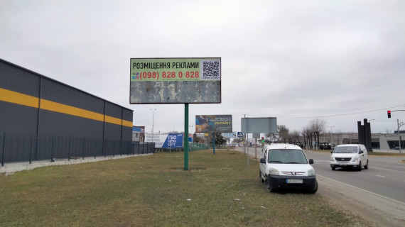 Білборд, Бігборд (Борд)  B у Вишневе, Board 3x6м  вул. Чорновола, навпроти буд. №39, перший за світлофором С/м "Рибний Світ", ТЦ "Арктика", направлення на Київ Фото 1