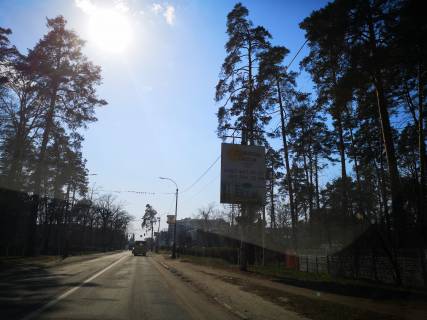 Билборд A в Буче, Board 3x4м  Автодорога Київ - Ковель, вул. Шевченко, перехрестя з вул.  Вокзальна, біля "Новус", в напрямку м. Буча фото 1