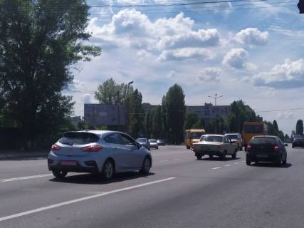 Билборд A в Вишневое, Board 3x6м  вул. Київська/вул. Святошинська/вул. Жулянська, світлофор, велике перехрестя, на виїзді, зупинка "Вишневе",  ЖК "Сади Вишневі", навпроти Ресторан "Райський Яр", напрямку центру м. Вишневе, в бік с. Святопетрівське, м. Боярка фото 1