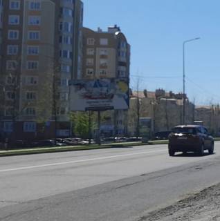 Білборд, Бігборд (Борд)  B у Святопетрівському, Board 3x6м  вул. Білогородська/ вул. Оборони, світлофор, в'їзд до Святопетрівське, напроти заїзду до ЖК "Петровський квартал", поруч "АТБ-Маркет", "Православна церква", в напрямку м. Вишневого, м. Києва Фото 1