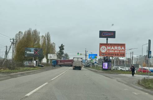 Билборд A в Святопетровском, Board 3x6м  вул. Білогородська/ на вул. Богатирську, перехресття, поруч "Сільпо",  ЖК "Амстердам", зупинка, 500м. "Фора", ЖК "Білий шоколад. Center",  "Розетка", Дніпро М",  в бік м Київ фото 1