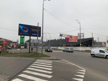 Билборд B в Гостомеле, 6х3  с. Гостомель, вул. Чкалова, 11-а (в'їзд в м. Ірпінь біля заправки "ОККО") фото 1