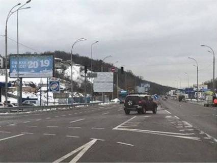Білборд, Бігборд (Борд)  B у Лісникі, 12х3  с. Лісникі, Новообухівське шосе / вул. Ватутіна, на світлофорі (біля ресторану "МакДональдс") в напрямку Києва Фото 1