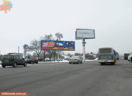 Призма  в Киеве Кольцевая дорога, на светофоре, рядом Гостиница, от МЕТRО к Жулян, правый - 38536 фото 1