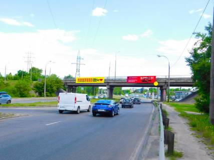 Билборд A в Киеве, 8x2  Шляхопровід на перетині вул. Добрининської та Богатирської, в напрямку до центру (праворуч) фото 1