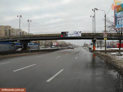 Нестандарт A у Києві Шляхопровід трамвайних через просп. Романа Шухевича (Генерала Ватутіна) на перетині Кибальчича вул. и Закревського, до центру (праворуч) Фото 1