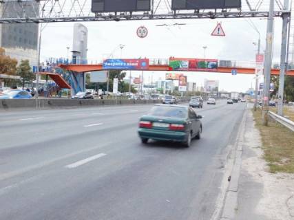 Билборд A в Киеве, 8x2  просп. Степана Бандери (Московський). / Йорданська вул. (Лайоша Гавро). надземний пішохідний перехід, в центр фото 1