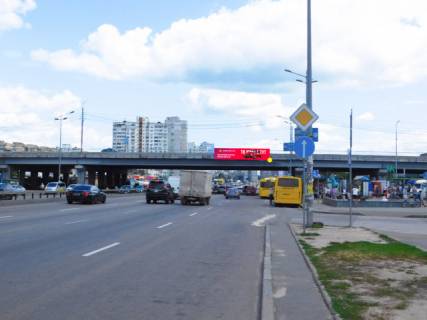 Билборд A в Киеве, 8x2  Бажана пр. / Ревуцького вул., ст.м. `Харківська`, з центру фото 1