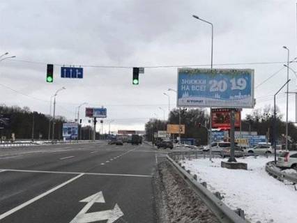Билборд A в Лесниках (Киевской обл), 6х3  с. Лісникі, Новообухівське шосе / вул. Ватутіна, 168 на світлофорі (біля "АТБ № 199") в напрямку Обухова фото 1