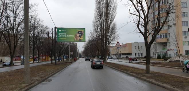 Билборд B в Харькове, 6x3  Олімпійська вул.,21 (Поліклініка №5, СМ "Брусничка") ,в напрямку просп. Льва Ландау (50-річчя СРСР) фото 1