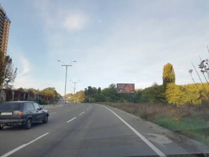 Билборд A в Киеве, 6x3  Велика Кільцева дорога (ЖК Міністерський), 300 м до перетину з просп. Литовський (Мінський)., в напрямку Гостомеля, Бучі фото 1