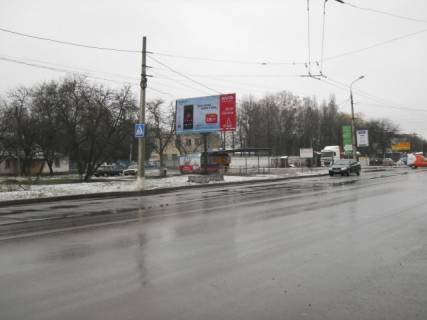 Билборд B в Сумах, 6x3  Білопільська вул,.38,(салон "Toyota", "In-Time", АЗС "ANP"), у напрямку  центра міста фото 1