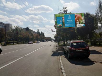 Билборд A в Киеве, 6x3  вул. Івана Виговського (Маршала Гречка) . (АЗС Кло, АТБ-маркет, ЖК Нивки Плаза), в напрямку Стеценка вул. фото 1