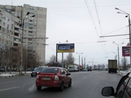 Білборд, Бігборд (Борд)  B у Харкові Гвардійців-Широнінців вул., 121 (маркет ПОСАД, супермаркет АТБ, Віва Піца), в напрямку вулиці Наталії Ужвій Фото 1