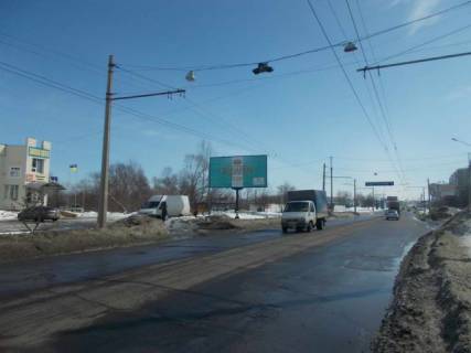 Билборд B в Сумах, 6x3  Героїв Крут вул.(Черепіна вул.),36 ,(салон меблів "Статус", "Еко- Маркет",АЗС "ANP",салони "Ssang Yong","Chery") ,у напрямку вул. Замостянській фото 1