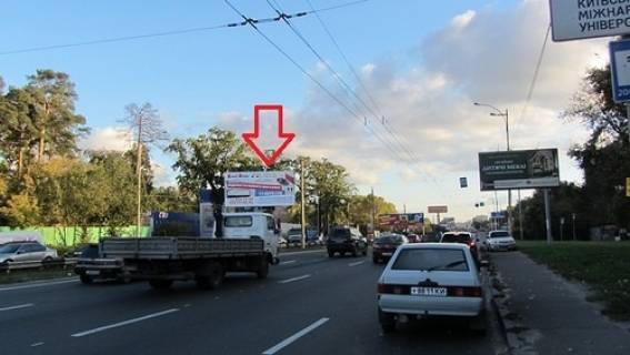 Білборд, Бігборд (Борд)  A у Києві, 6x3  Кільцева дорога, поворот на Котельникова М. вул., (СТО Кінг авто), на роздільніку, в напрямку Одеської пл. Фото 1