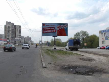 Билборд A в Сумах, 6x3  Героїв Крут вул.(Черепіна вул.),36 ,(салон меблі "Статус", "Еко- Маркет",АЗС "ANP",салони "Ssang Yong","Chery") ,у напрямку Революції Гідності вул. (Супруна) фото 1