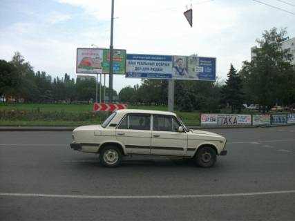 Білборд, Бігборд (Борд)  A у Одесі пл-дь Дерев'янко кут Ріхтера Святослава вул. (Щорса) Св. А Фото 1
