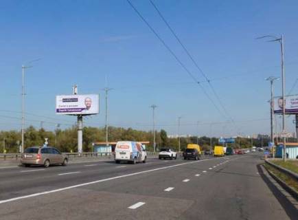 Білборд, Бігборд (Борд)  B у Києві, 5x12  Шухевича Романа просп. (Генерала Ватутіна просп.), : парк Дружби народів; Північний міст (Московський міст) (у напрямку  Троєщини) Фото 1