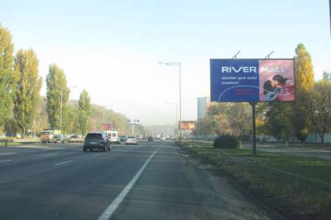 Билборд A в Васильевке, 3x6  Столичне шосе, 1,5 км до Південого мосту (в напрямку Південого мосту) фото 1