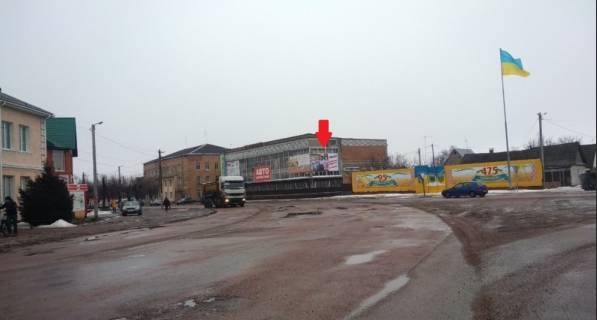 Билборд A в Черняхове ЧЕРНЯХІВ. Вул. Володимирська 2. центр, универмаг, маркети"КВАРА""ТРЕШ"  "БІРРЛІН", в напр. на Житомир права фото 1