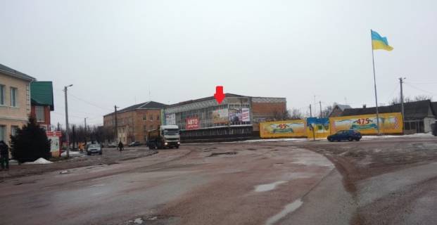 Билборд A в Черняхове ЧЕРНЯХІВ. Вул. Володимирська 2. центр, универмаг, маркети"КВАРА""ТРЕШ" "БІРРЛІН", в напр. на Житомир ЛІВА фото 1