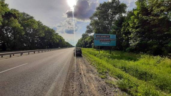 Білборд, Бігборд (Борд)  A на трасах Хмельницької області М-12 Стрий-Тернопіль-Кропивницький-Знам’янка, км. 284+200 (між с.Прибузьке та Пирогівці) Фото 1