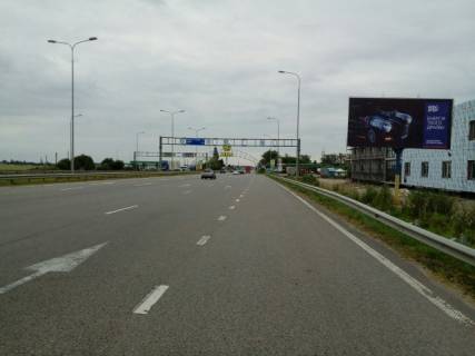 Билборд A в Житомире, 3x6  Траса Житомир-Київ. Перед заправкою  WOG, напрямок з Житомира на Київ фото 1