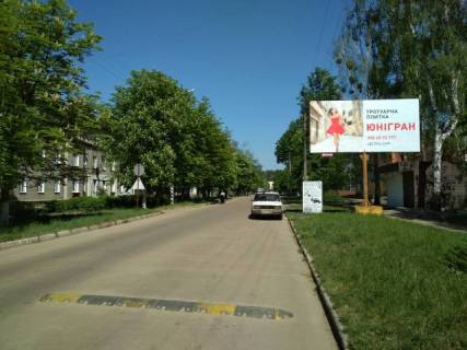 Билборд A в Иршанске, 3x6  Шевченка ул.,11 центр города,школа фото 1
