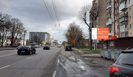 Білборд, Бігборд (Борд)  A у Хмельницькому, 2,32*3,14  вул.Шевченкa, 8 , неподалік: відділення Банків, Супермаркети та дрібна комерція Фото 1