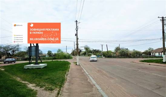Билборд B в Лугинах вул.К. Маркса 23 а фото 1