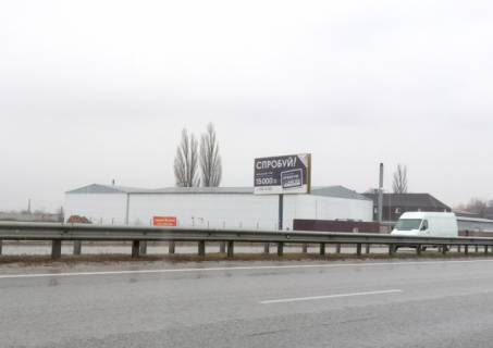 Billboard B in Lyubimivka, 3х6  Zitomirs'ke sose, s.Lubimivka, sad.centr "Artemida",Victoria Film Studio  - z Kieva Photo 1