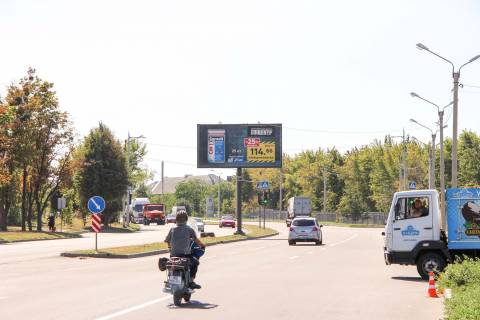 Білборд, Бігборд (Борд)  B у Харкові, 3х6  просп. Льва Ландау (50-річчя СРСР) 27 (5), з центру Фото 1
