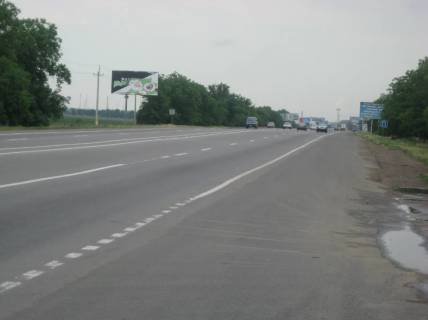 Билборд B в Авангард (Авангард), 3х6  транспорт рухається від  двох стовпів, з Авангарда фото 1