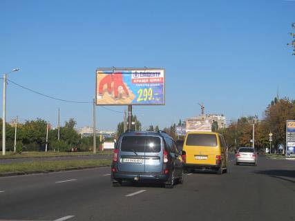 Білборд, Бігборд (Борд)  A у Харкові, 3х6  просп. Льва Ландау (50-річчя СРСР) 55, в центр Фото 1