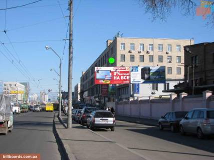 Билборд A в Киеве ст.м. Почайна (колишня Петрівка), просп. Степана Бандери (Московський), 8 (завод "Маяк"), напр. Эпицентра, с/маркет дверей Porte’s, военторг ДиСи, со стороны ул. Е.Телиги, загруженная транспортная артерия (левая, "призма") фото 1