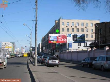 Билборд A в Киеве ст.м. Почайна (колишня Петрівка), просп. Степана Бандери (Московський), 8 (завод "Маяк"), напр. Эпицентра, с/маркет дверей Porte’s, военторг ДиСи, со стороны ул. Е.Телиги, загруженная транспортная артерия (левая, "призма") фото 1