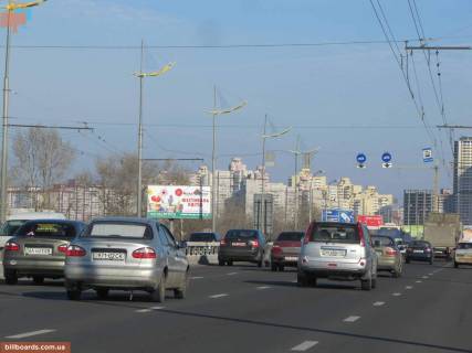 Білборд, Бігборд (Борд)  B у Києві просп. Романа Шухевича (Генерала Ватутіна) - Північний міст 01 (колишня. Московський), ТРЦ SkyMall, г / м Ашан; напр. з правого берега / Деснянський р-н Фото 1