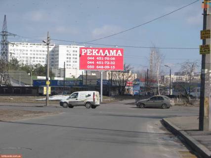 Билборд A в Киеве Рынок "Юность" - пересечение ул. Алишера Навои / Жмаченко / Миропольская и Остафія Дашкевича вул. (Курнатовського) фото 1