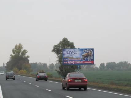 Білборд, Бігборд (Борд)  A на трасах Київської області, 3х6  А/д Н-08 Бориспіль-Дніпро-Маріуполь 07, км 21+050 м, ліворуч / напрямок на Київ; АФ "Наша Ряба" (МХП); за виїздом з с.Мирне Фото 1