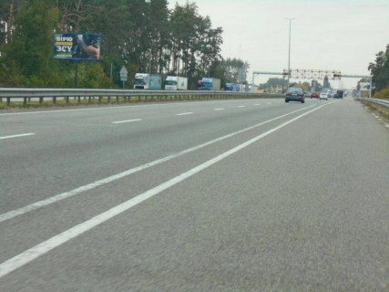 Billboard B in Buzova, 6х3  с. Бузова, траса М-06 "Київ-Чоп" (Житомир), км 36+150 ліво, за 150м до TIR автомобільної стоянки, за 750м до ресторану "Бістро Пекаря", за 850м до отелю "Мезон Бланш", через 200м після АЗС БРСМ-Нафта Photo 1